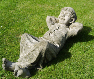 Tuc reclining monk stone statue